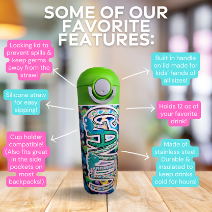 12 oz water bottle with flip top and built in straw. Colorful dinosaur themed water bottle for kids. Back to school water bottle for kids. Dinosaurs in yellow, green, purple and blue with navy blue background and green lid.