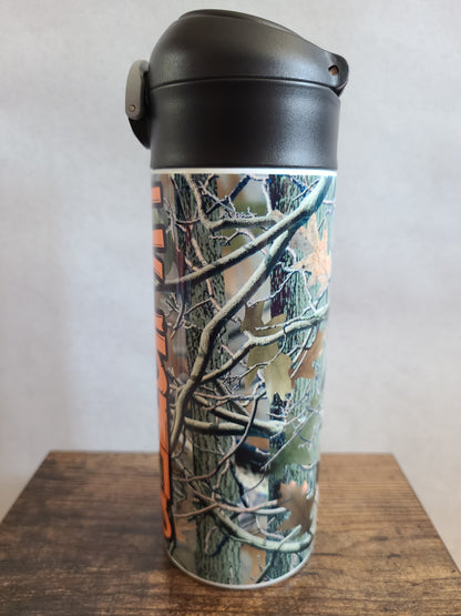 12 oz water bottle with a black lid that has a built-in straw, locking push button and handle. This design features real tree camo with orange personalization. Back to School.